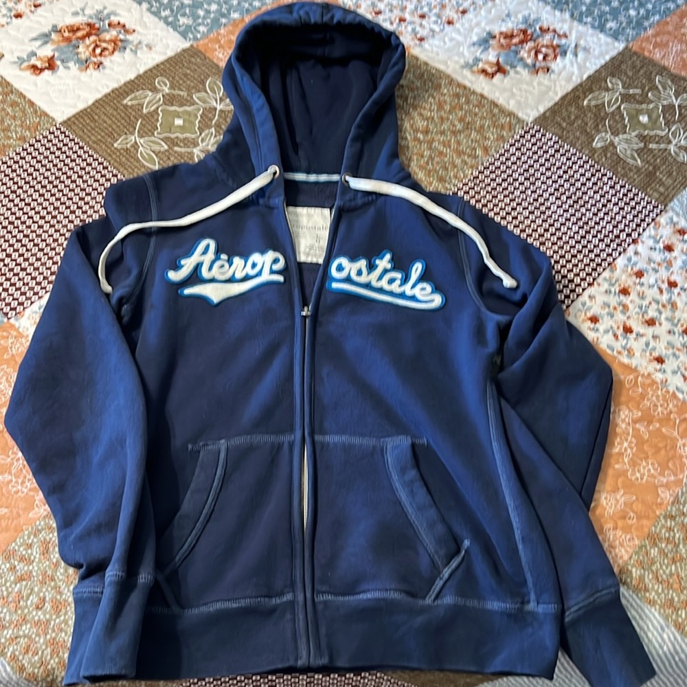 Dark Blue Aeropostale jacket. Size large, with hood and drawstring tie, zip up.